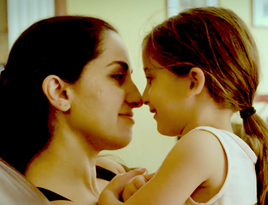 Still of mother and daughter touching noses from the docu-style short &quot;Testing Stories: Leyna&quot;